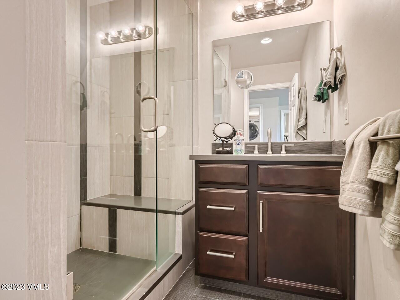 67 Robins Egg Eagle, CO 81631 - Photo 22 of 38 a kitchen with a sink and a refrigerator