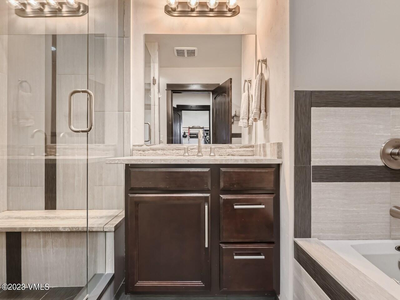 67 Robins Egg Eagle, CO 81631 - Photo 26 of 38 a kitchen with a sink and a refrigerator