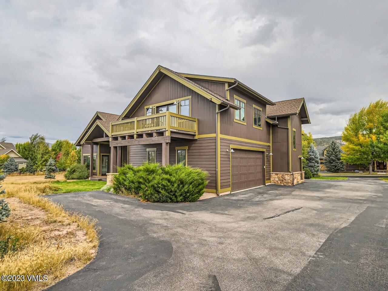 67 Robins Egg Eagle, CO 81631 - Photo 36 of 38 front view of a house with a street