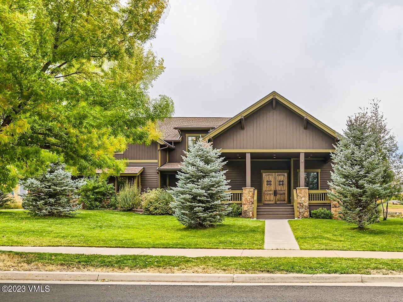 67 Robins Egg Eagle, CO 81631 - Photo 4 of 38 a front view of a house with a yard