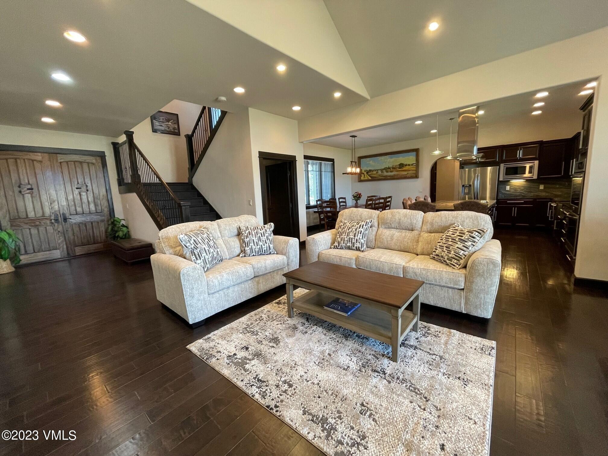 67 Robins Egg Eagle, CO 81631 - Photo 6 of 38 a living room with furniture and wooden floor
