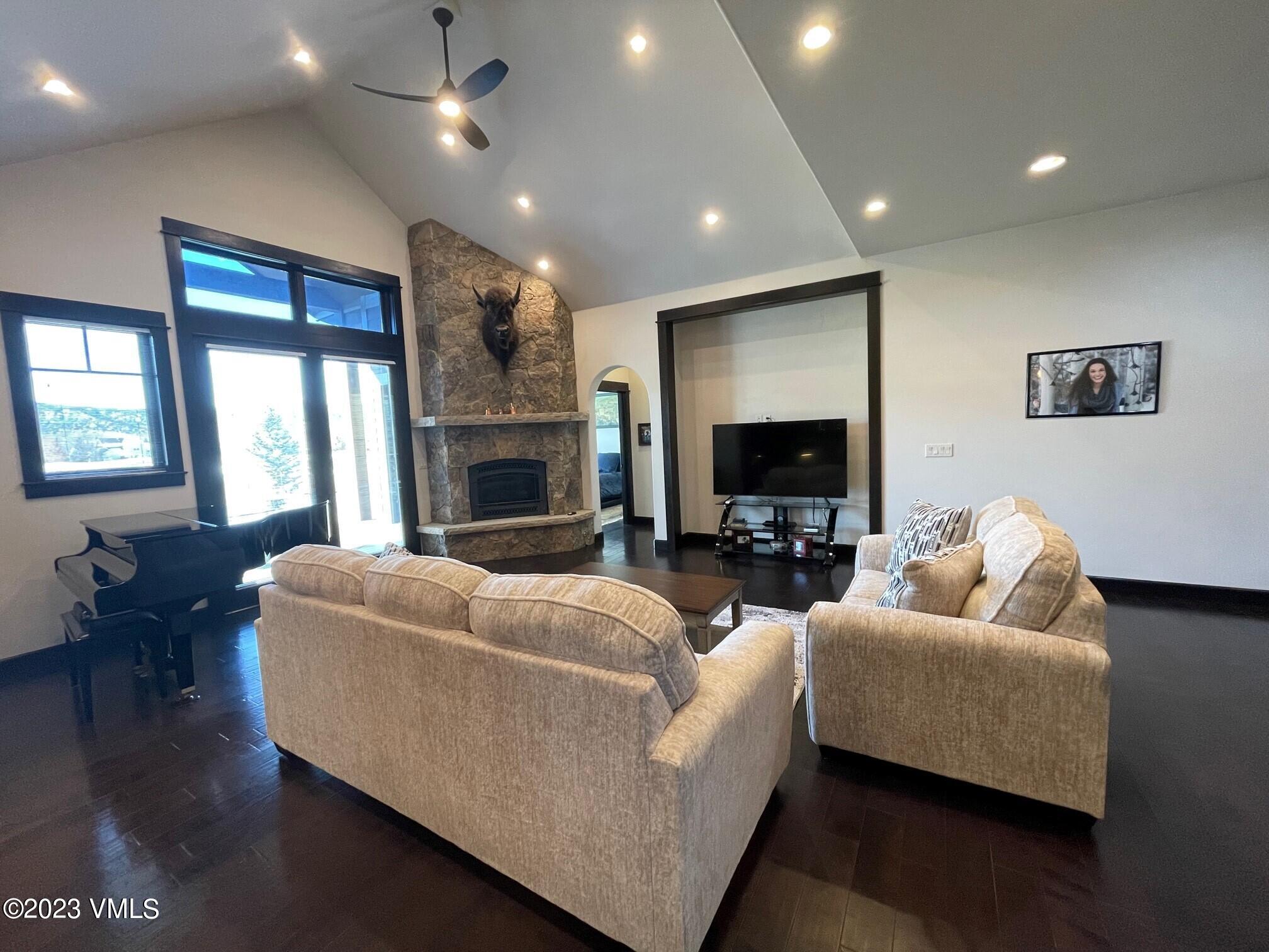 67 Robins Egg Eagle, CO 81631 - Photo 7 of 38 a living room with furniture and a flat screen tv