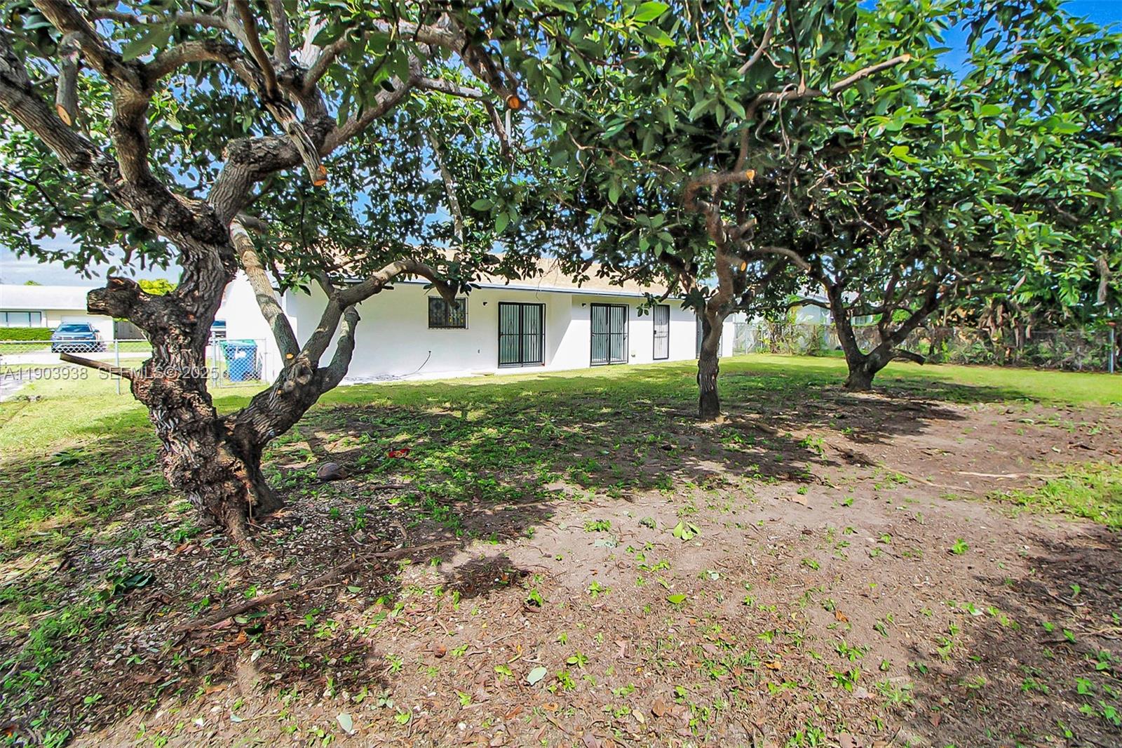 13224 Southwest 253rd Terrace Homestead, FL 33032 - Photo 17 of 19 a house is sitting in middle of the forest