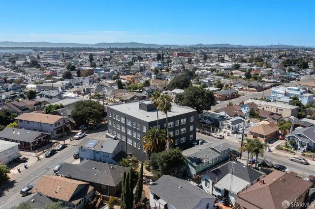 an aerial view of a city with lots of residential buildings