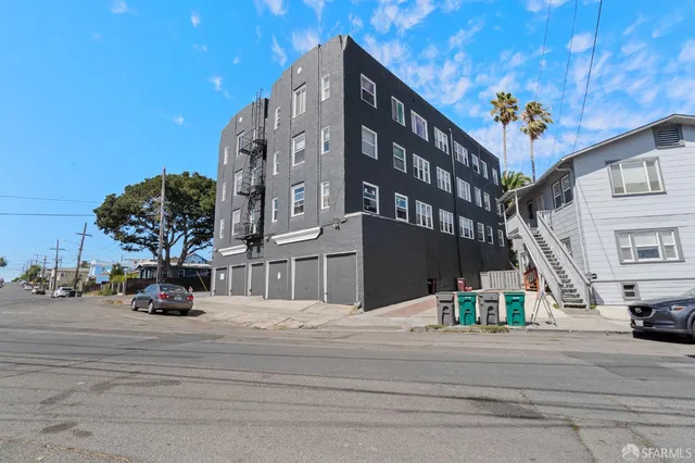 a view of a building with a street