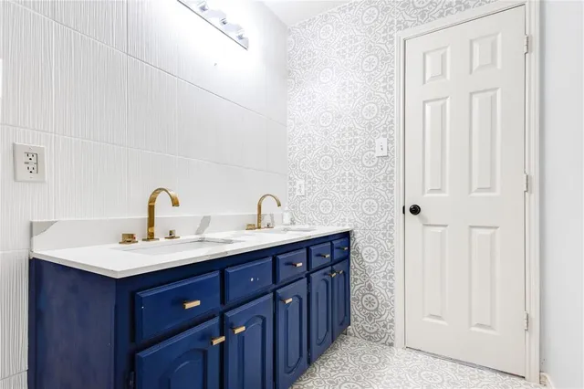 a white toilet sitting next to a bath tub and shower