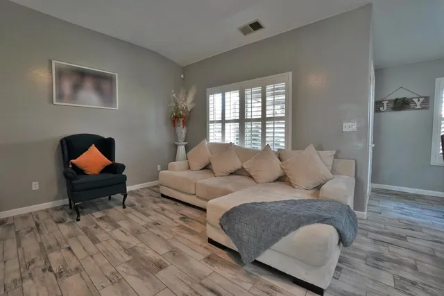 a view of gallery with wooden floor