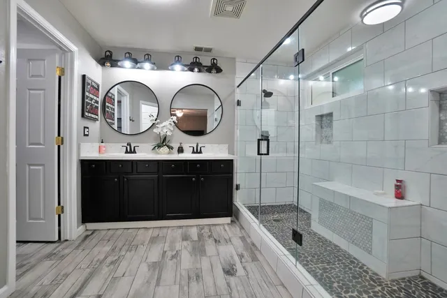 a view of a house with a yard and sitting area