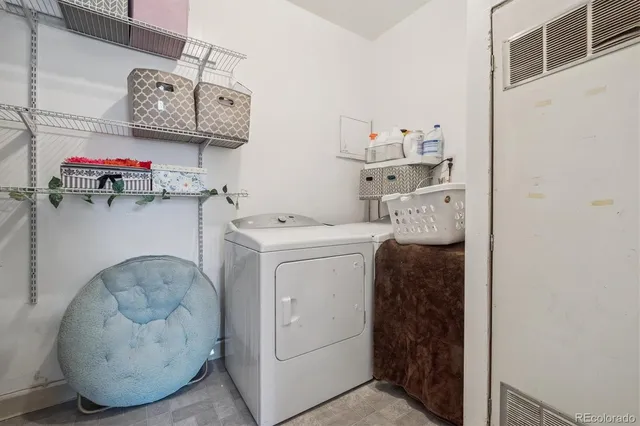 a view of a backyard with sitting area