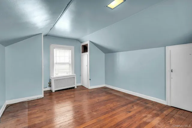 a view of a chairs and table in backyard