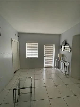 a view of a livingroom with furniture