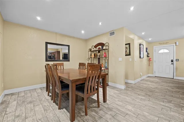 a view of a dining room with furniture
