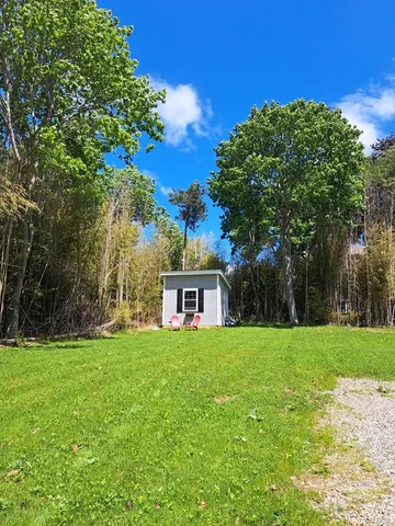 a house view with a garden space