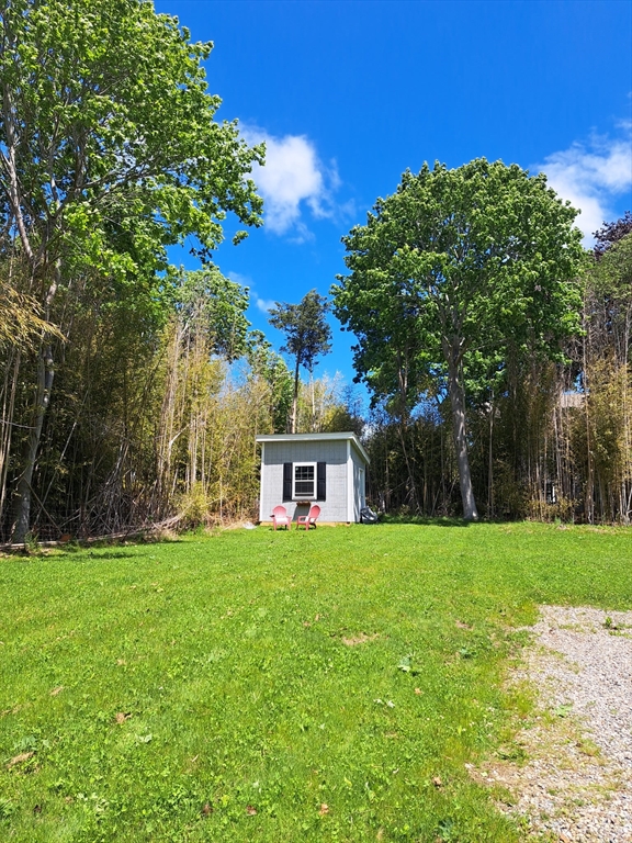 794 Sandwich Road Falmouth, MA 02536 - Photo 3 of 17 a house view with a garden space