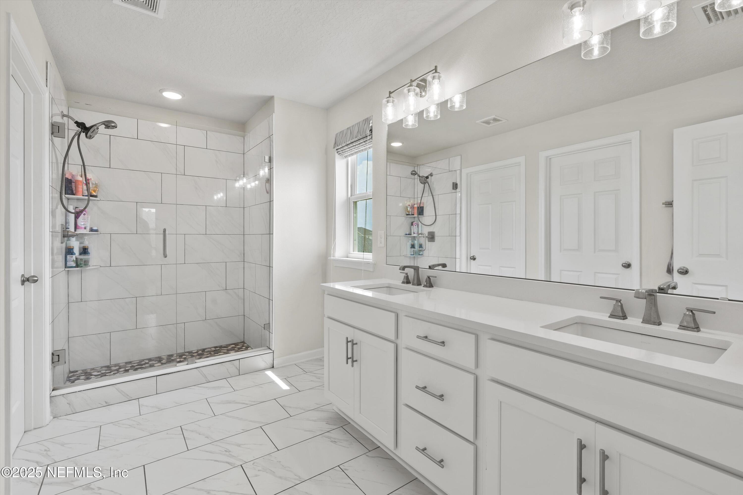 374 Elm Crk Drive St. Augustine, FL 32092 - Photo 17 of 47 Primary Bathroom