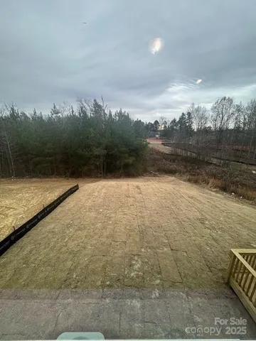 a view of swimming pool with outdoor seating