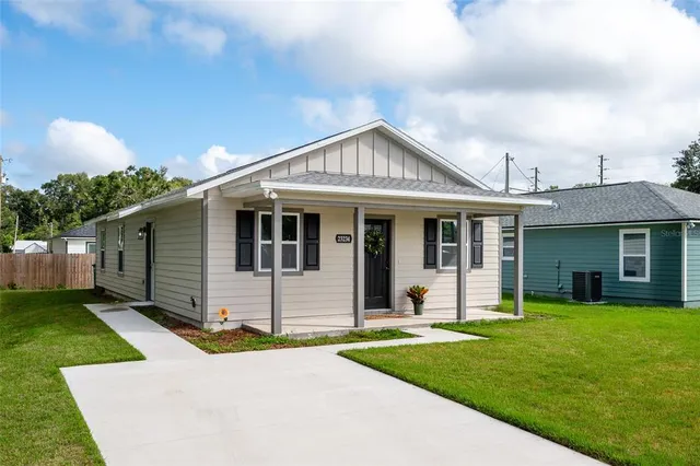 front view of a house with a yard