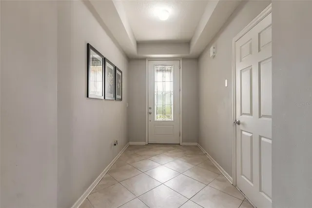 a view of kitchen with furniture and a window