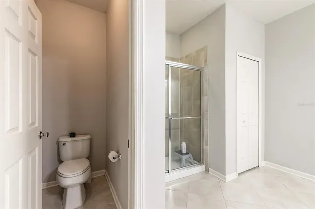 a view of storage and utility room with stairs