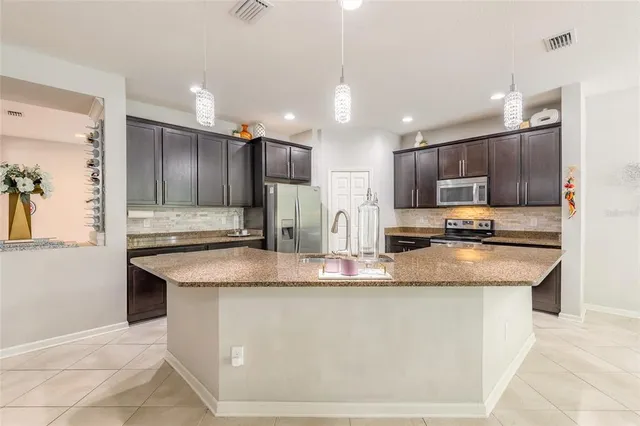 a swimming pool with patio outdoor seating and yard