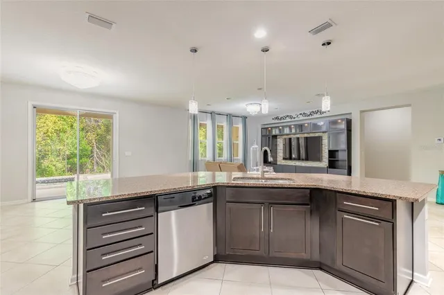 an aerial view of a house with a garden