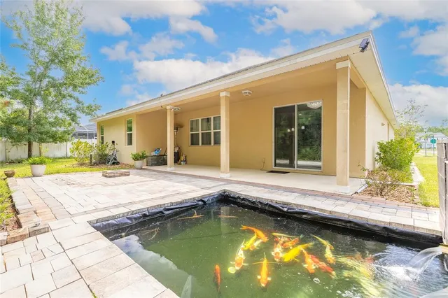 an aerial view of a house with a garden