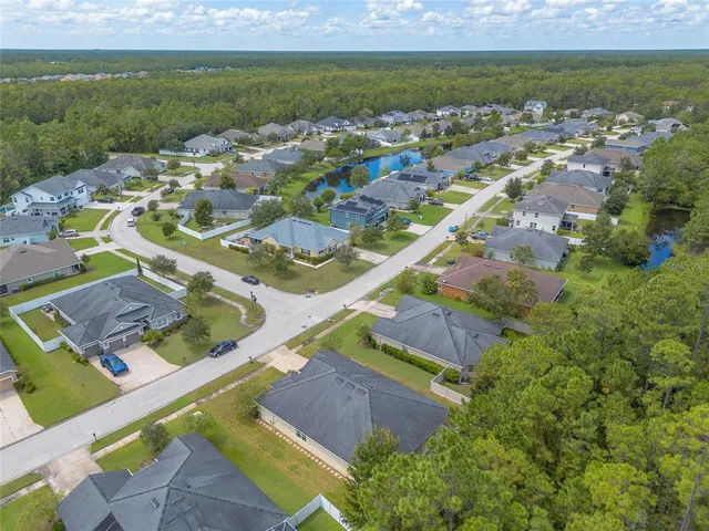 a view of residential houses with outdoor space