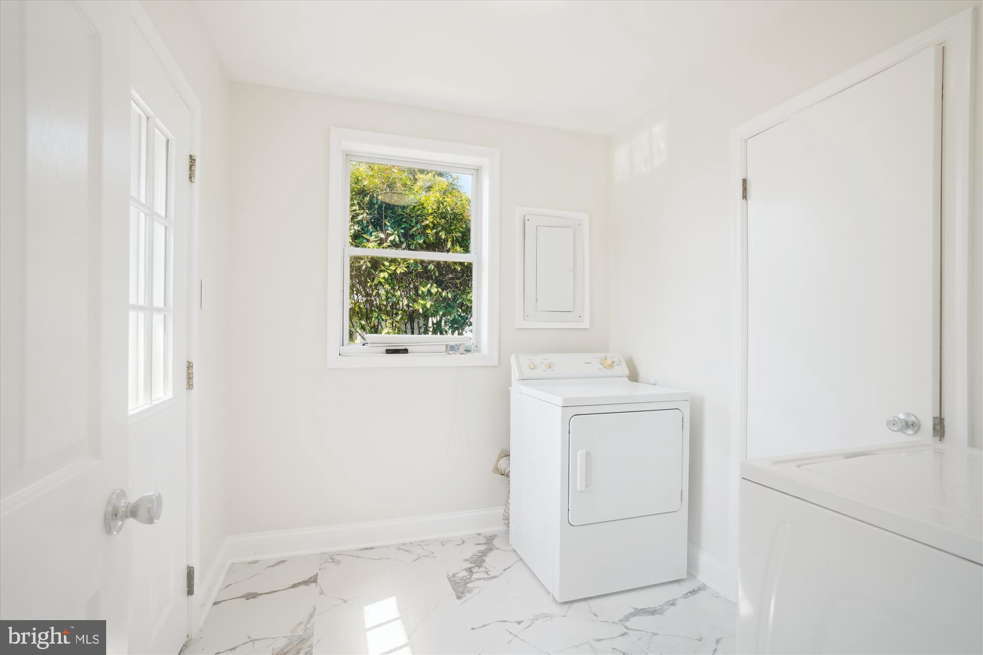 3143 Calvert Boulevard Lusby, MD 20657 - Photo 33 of 36 a bathroom with a sink and a vanity