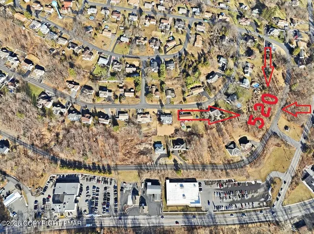 a view of a backyard of the house