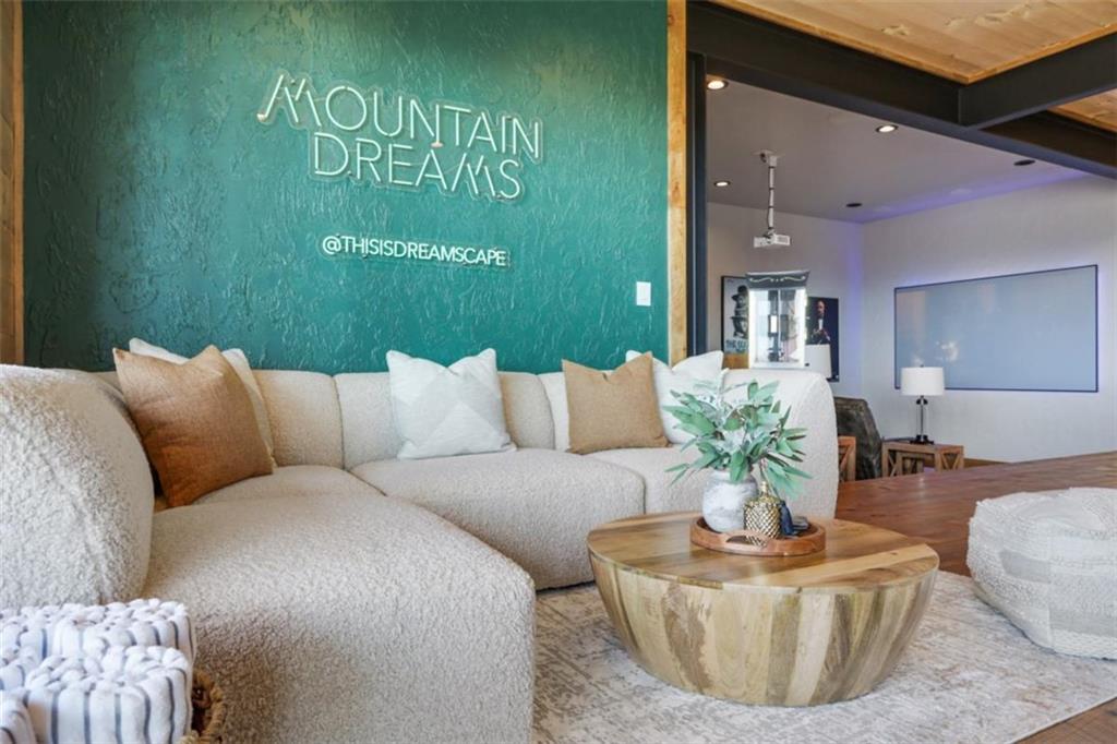226 Round Top Road Mineral Bluff, GA 30559 - Photo 23 of 78 a living room with furniture and a potted plant