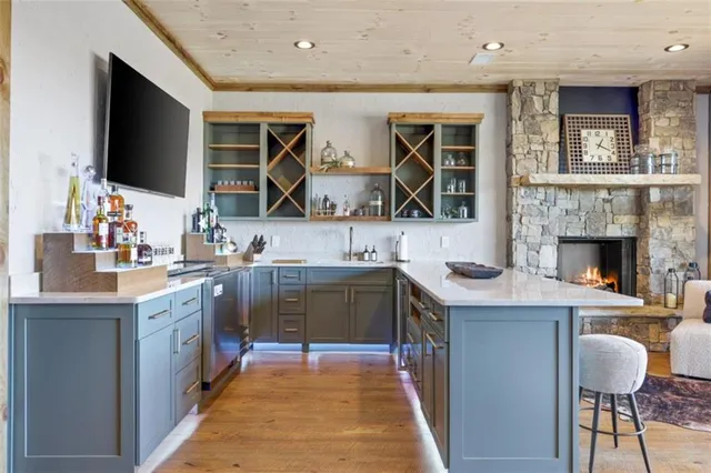 a kitchen with a stove and a microwave
