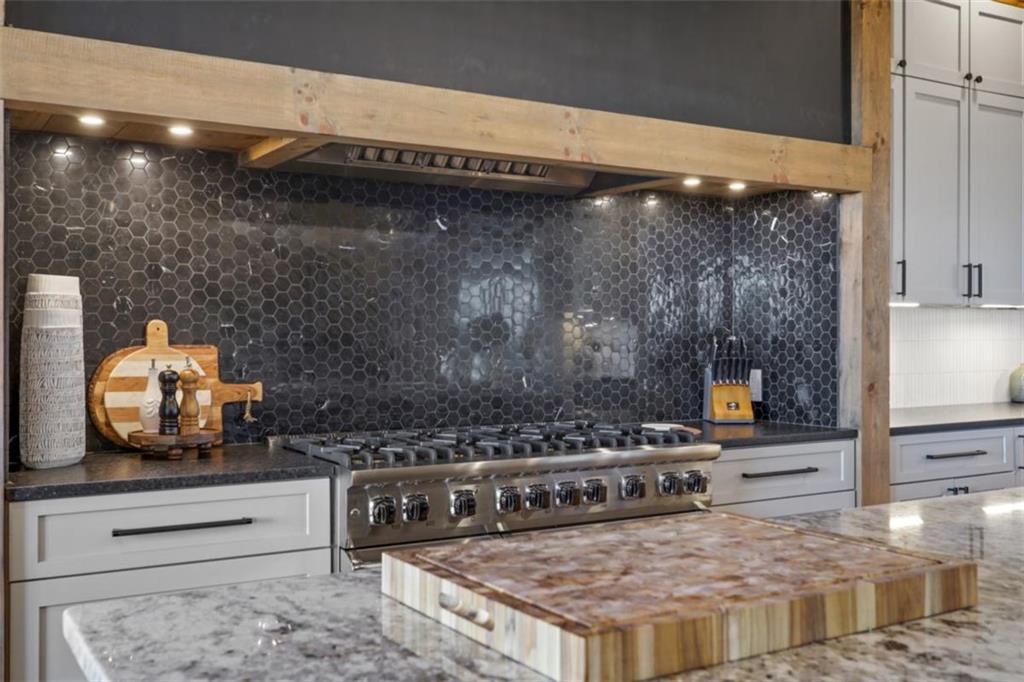 226 Round Top Road Mineral Bluff, GA 30559 - Photo 45 of 78 a kitchen with a stove and a microwave