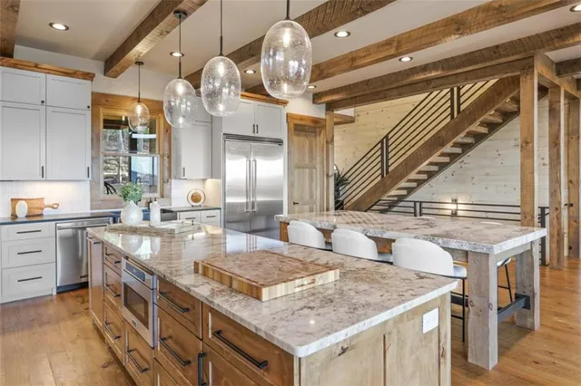 a view of a balcony with wooden floor