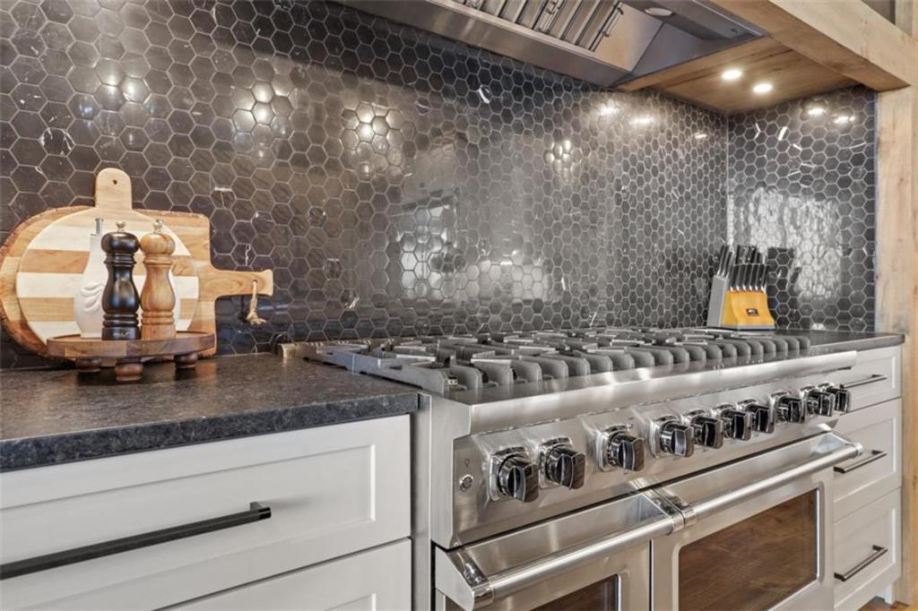 226 Round Top Road Mineral Bluff, GA 30559 - Photo 50 of 78 a kitchen with a stove and a sink