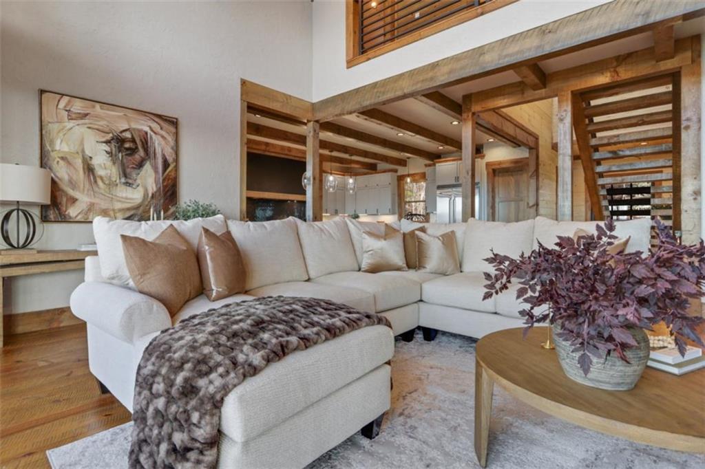 226 Round Top Road Mineral Bluff, GA 30559 - Photo 55 of 78 a living room with furniture and a large window