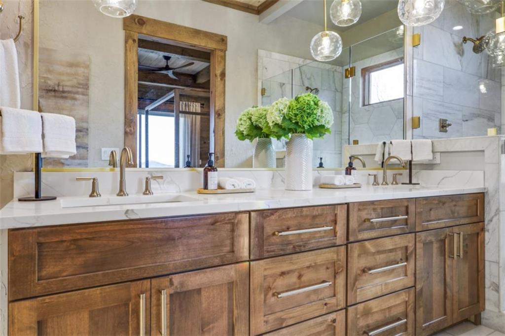 226 Round Top Road Mineral Bluff, GA 30559 - Photo 68 of 78 a bathroom with a sink and a mirror