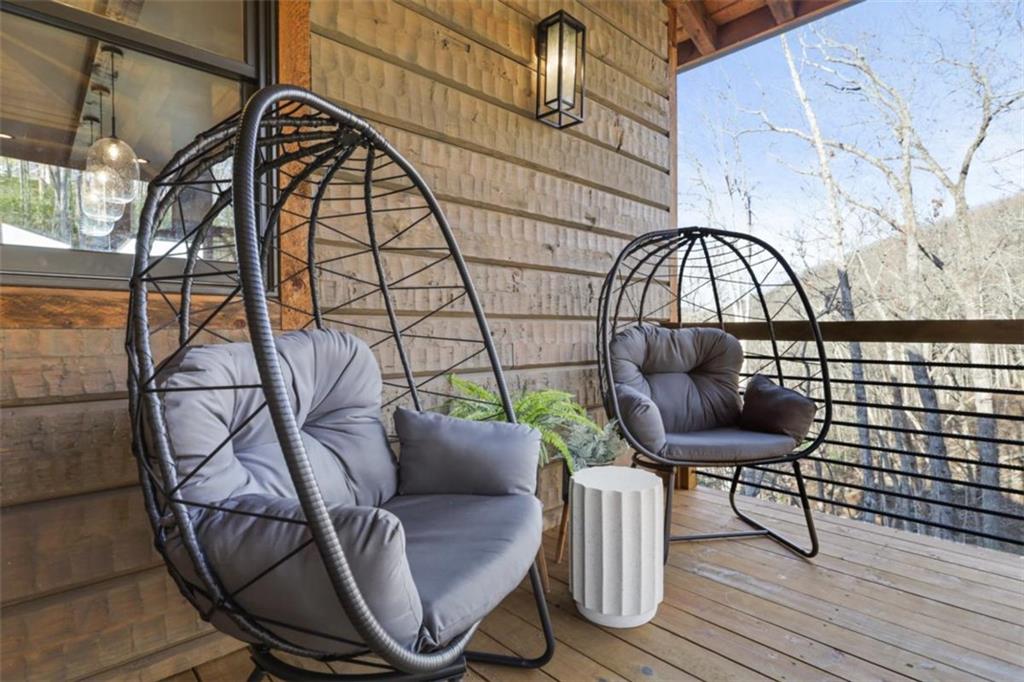 226 Round Top Road Mineral Bluff, GA 30559 - Photo 76 of 78 a view of a chairs and table in the balcony