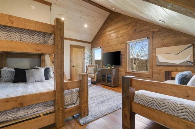 a bathroom with a double vanity sink and a toilet