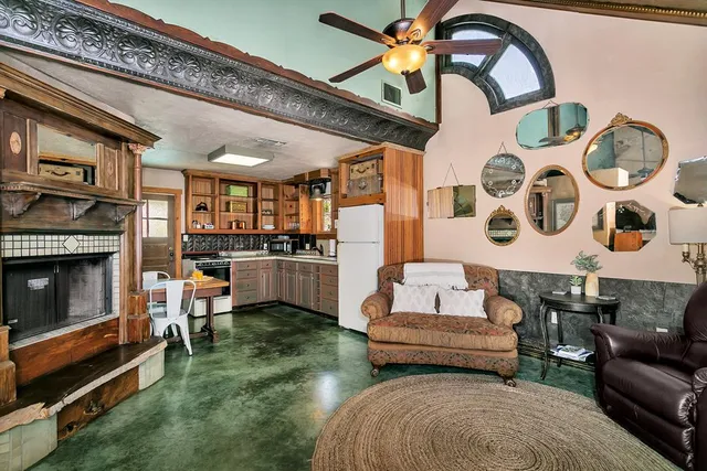 a bedroom with a bed and lamp