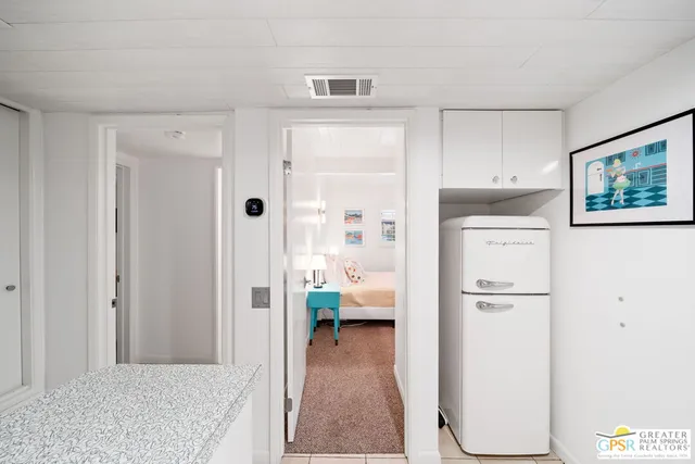 a indoor swimming pool with outdoor seating