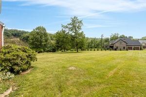 18 Ellen Drive McKees Rocks, PA 15136 - Photo 2 of 23 a view of a swimming pool with an outdoor space and seating area