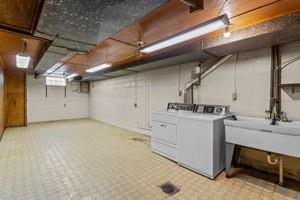 18 Ellen Drive McKees Rocks, PA 15136 - Photo 22 of 23 a utility room with cabinets