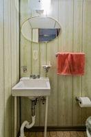 18 Ellen Drive McKees Rocks, PA 15136 - Photo 23 of 23 a bathroom with a sink and mirror