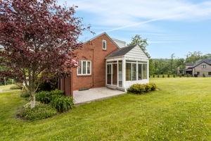 18 Ellen Drive McKees Rocks, PA 15136 - Photo 4 of 23 a front view of a house with garden