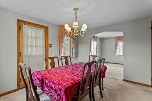 18 Ellen Drive McKees Rocks, PA 15136 - Photo 9 of 23 a view of a dining room with furniture and chandelier
