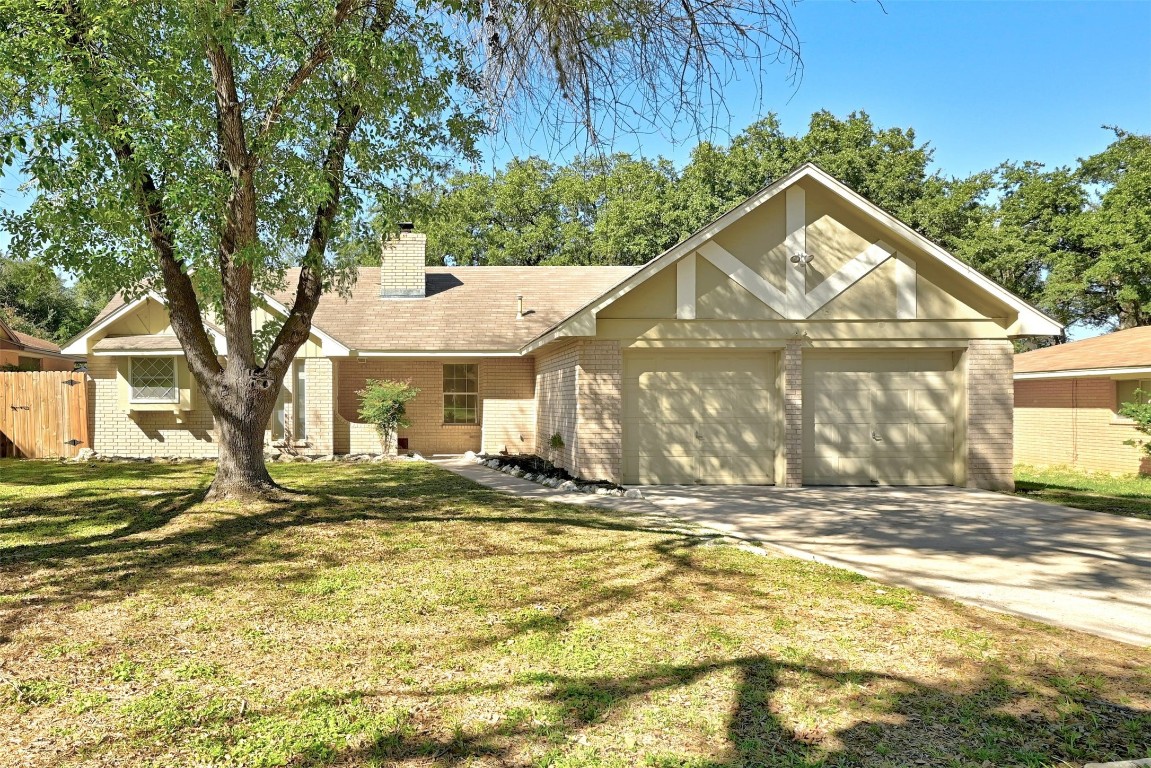 5622 Wagon Train Road Austin, TX 78749 - Photo 1 of 1 a view of a house with a yard
