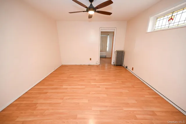 a view of a big room with carpet