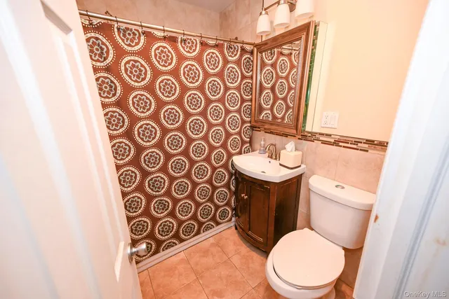 a view of a house with porch and furniture