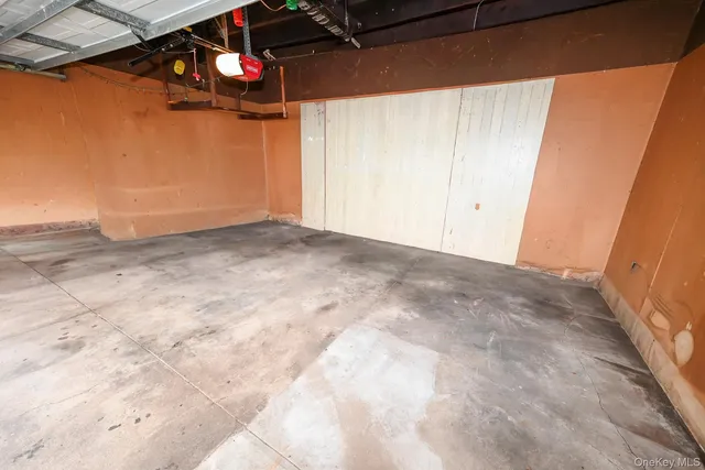 a view of a room with large windows