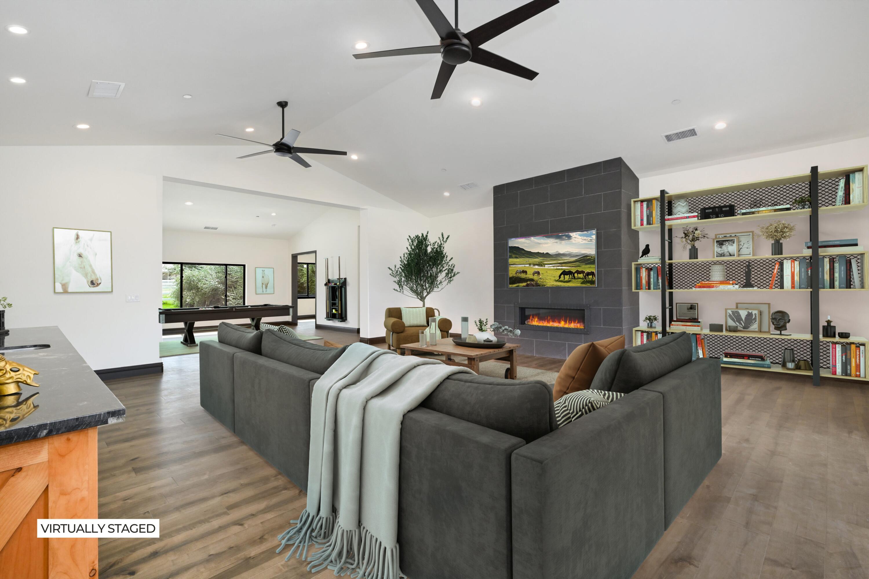 17370 Rodeo Road Lake Elsinore, CA 92530 - Photo 13 of 68 a living room with furniture and a flat screen tv